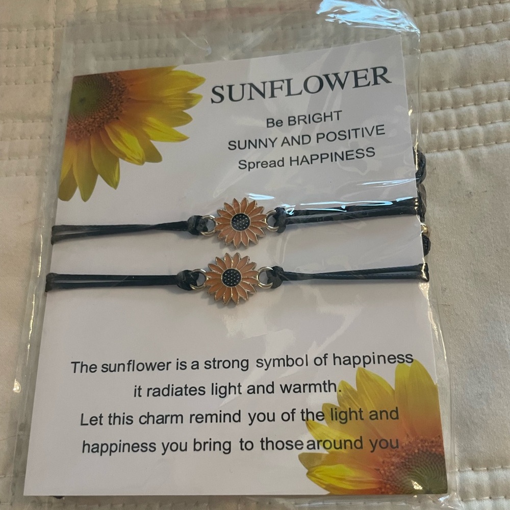 Sunflower bracelets.  Brand new in package